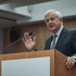 Schneider Defends Carbon Pricing Mechanism Against Repeal Attempts